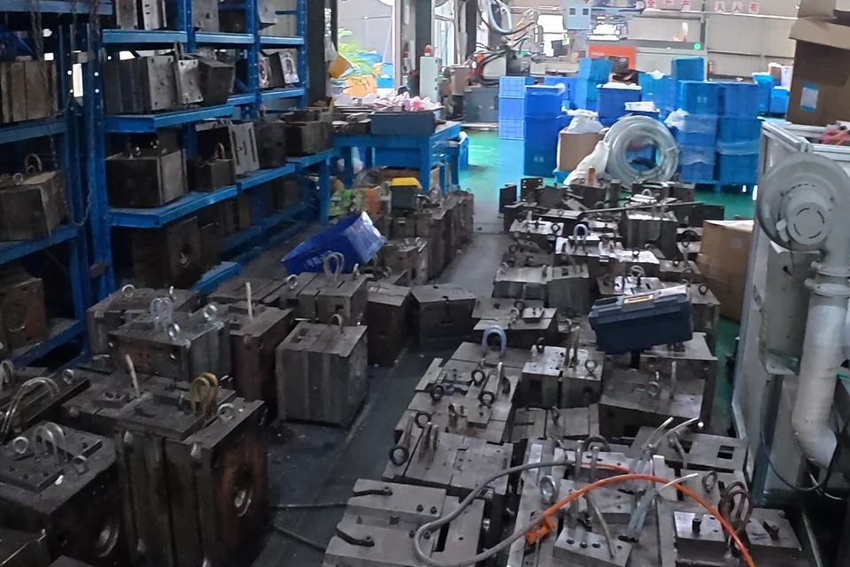 Moulds and shelving in a stationery tooling workshop